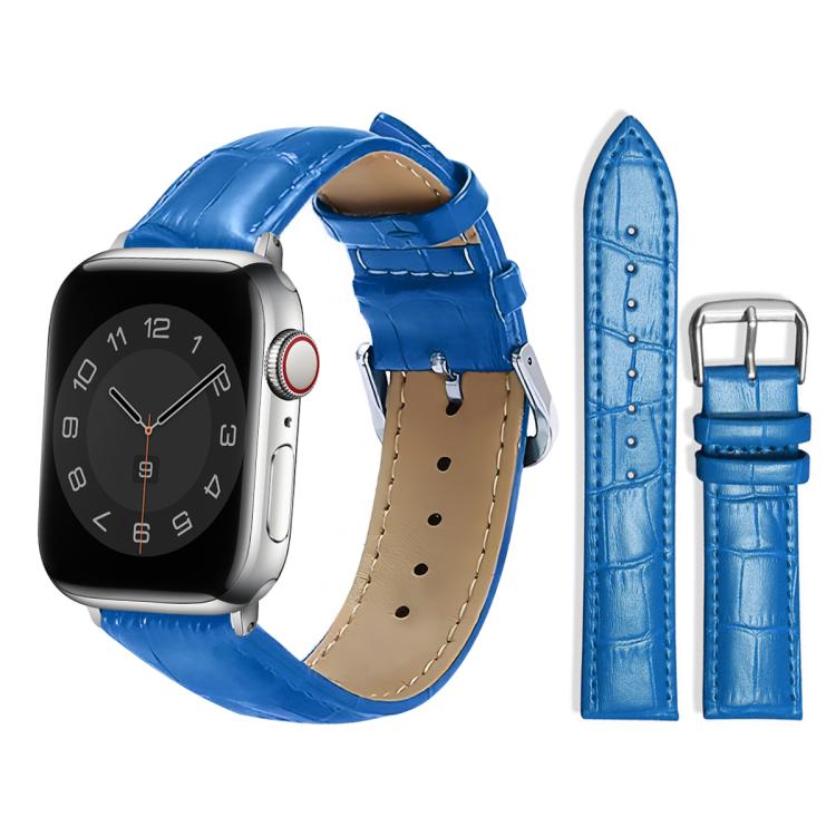 Blue textured leather Apple Watch band with cream stitching and silver pin buckle.
