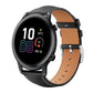 Black leather watch band with white stitching and a silver buckle on a round smartwatch.