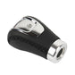Black leather gear shift knob with chrome base and circular mounting hole