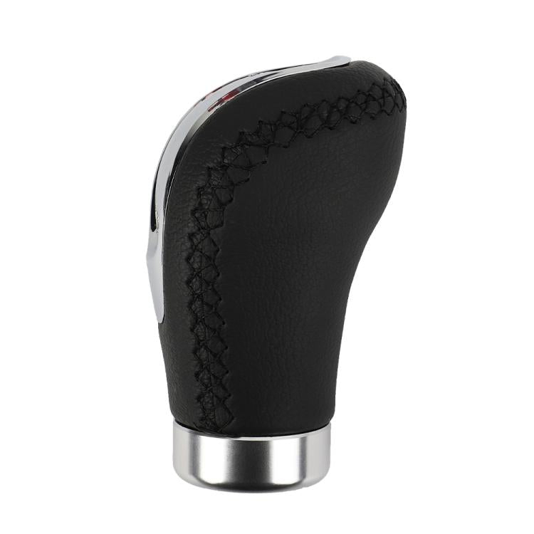 Black leather gear shift knob with stitched grip panel and chrome rim