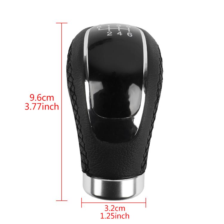 Black leather gear shift knob with chrome top and stitched grip texture
