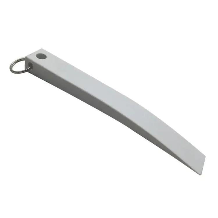 Gray plastic trim removal wedge tool with loop ring for lifting interior trim