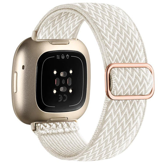 Apricot woven nylon stretch watch band with adjustment buckle on a compatible smartwatch