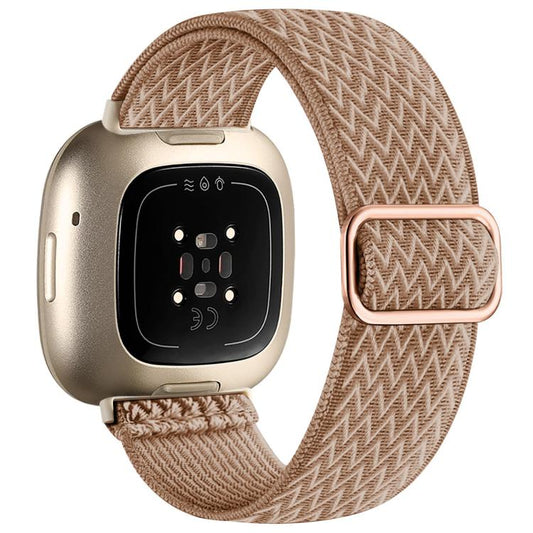 Milk tea woven nylon stretch watch band with adjustment buckle on a compatible smartwatch