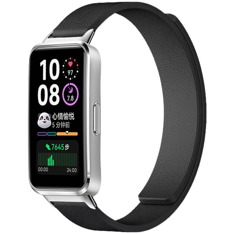 Black magnetic silicone watch band with textured surface, shown attached to a smartwatch.