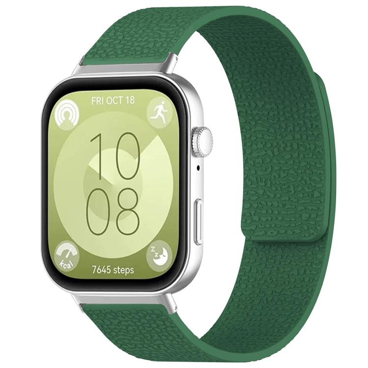 Textured dark green silicone watch band shown fitted to a smartwatch.