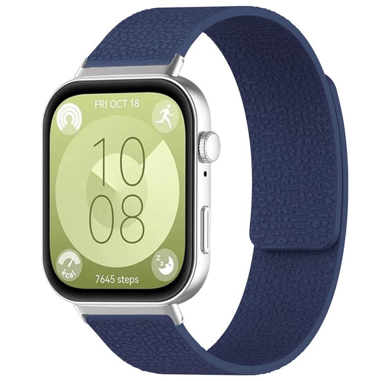 Textured navy silicone watch band shown fitted to a smartwatch.