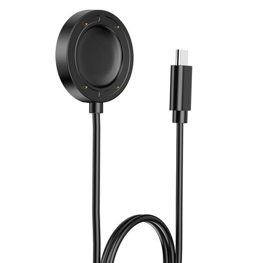 Angled view of the black Suunto Run charger puck and USB-C cable plug