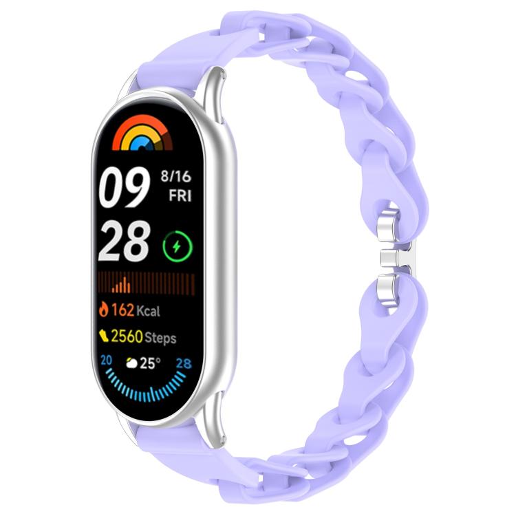 Light purple hollow-link silicone watch band fitted to a smartwatch.