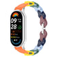 Multicolor hollow silicone watch band on a silver Xiaomi Smart Band