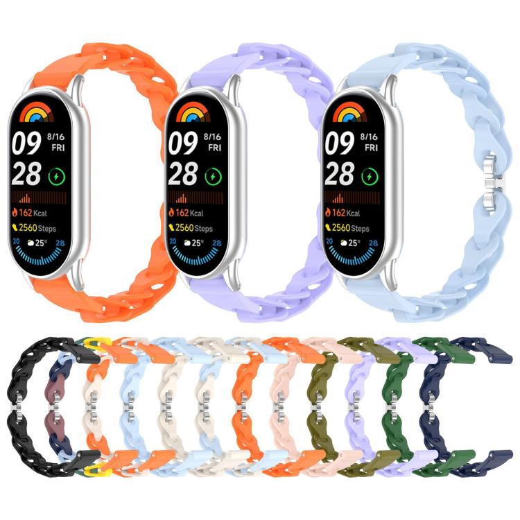 Hollow silicone watch bands in assorted colors, shown with Xiaomi Smart Bands
