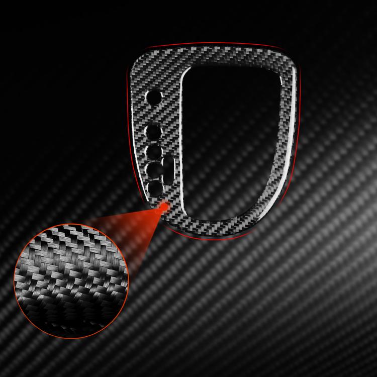 Black carbon fiber gear position panel sticker detail with oval cutout