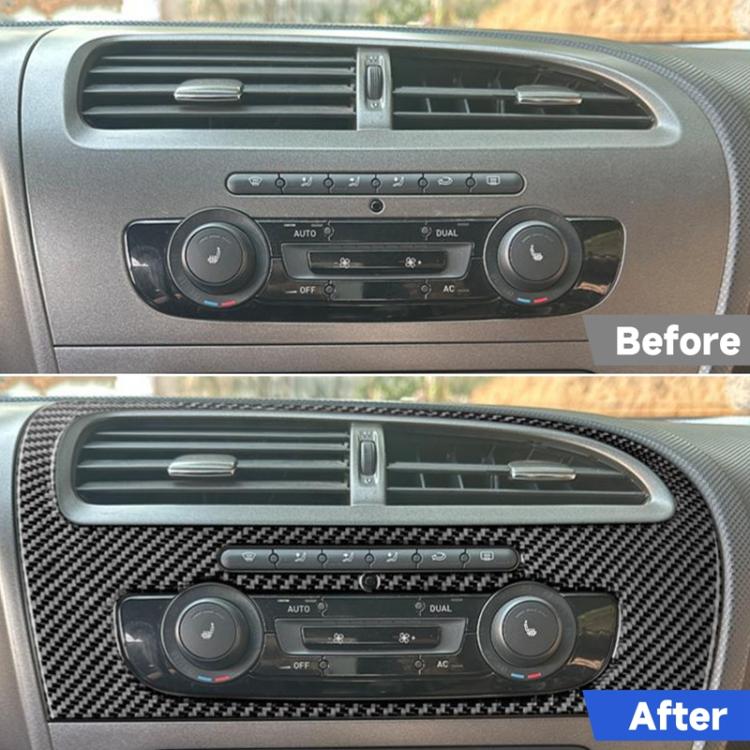 Black carbon-fiber center console trim showing air vent surround and climate control