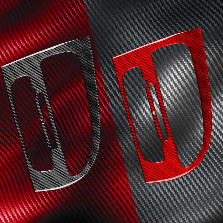 Red carbon-fiber style console trim insert with silver edge and curved cutouts