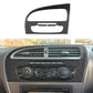 Black carbon-fiber air vent trim panel with two openings installed on center console