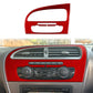 Red carbon-fiber air vent trim panel with two openings installed on center console