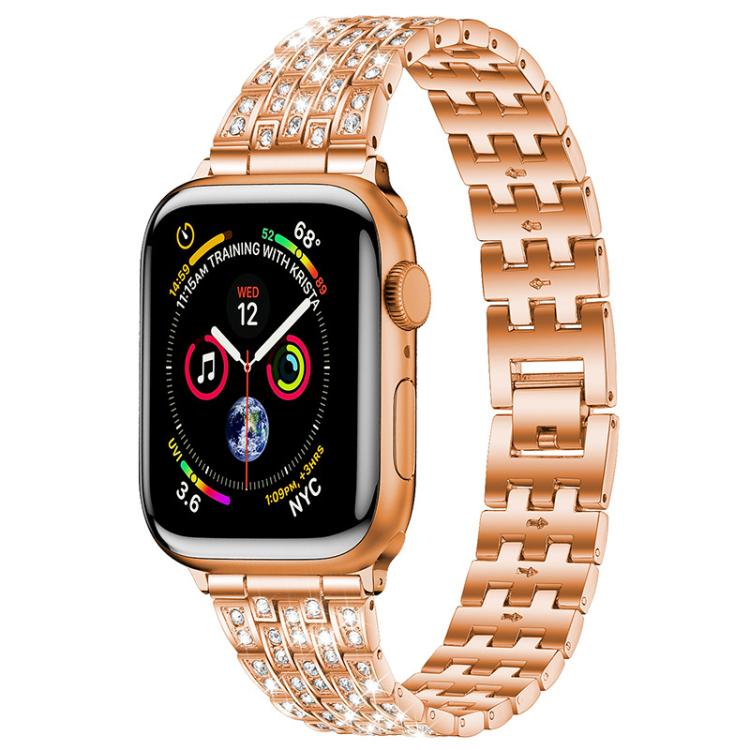 xDfind rose gold metal Apple Watch band with five rows of clear stones, shown attached to a watch