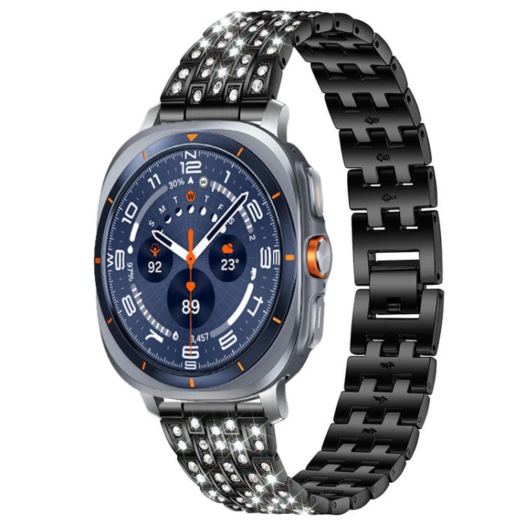 Black five-row metal watch band with clear stones, shown on a smartwatch with a dark blue dial.