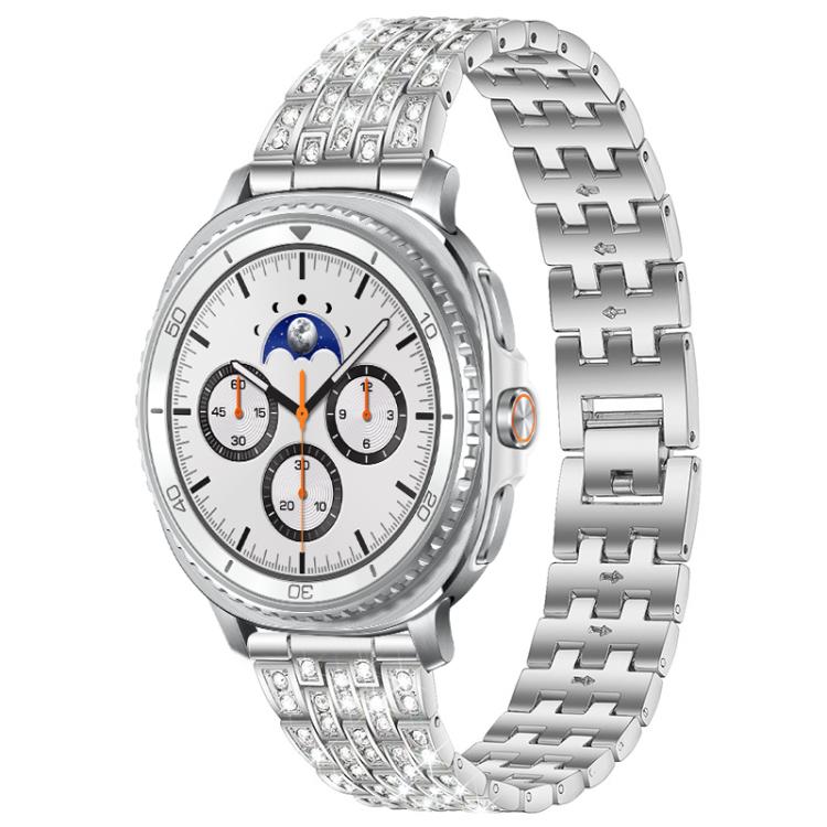 Silver five-row metal watch band with clear stones, shown on a smartwatch with a white dial.