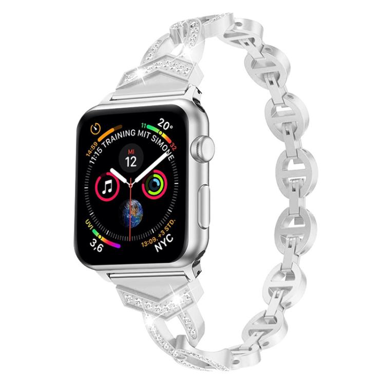Silver crystal-accented stainless steel band attached to an Apple Watch