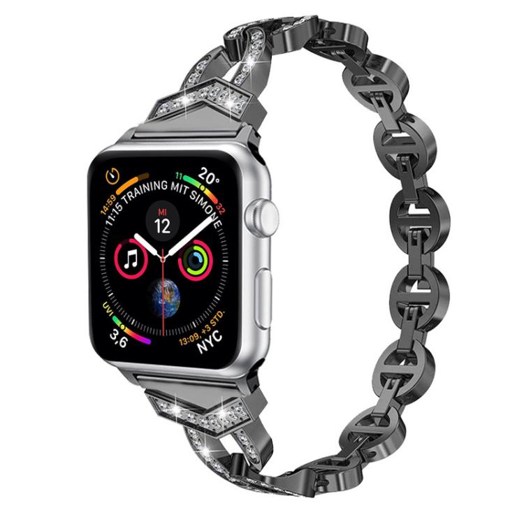 Black crystal-accented stainless steel band attached to an Apple Watch
