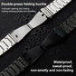 Stainless steel Apple Watch bands showing the open double-press folding clasps