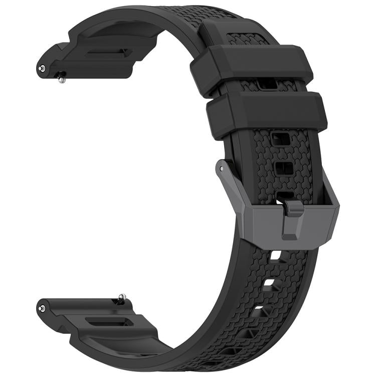 Black silicone watch band with textured inner surface, buckle, and adjustment holes