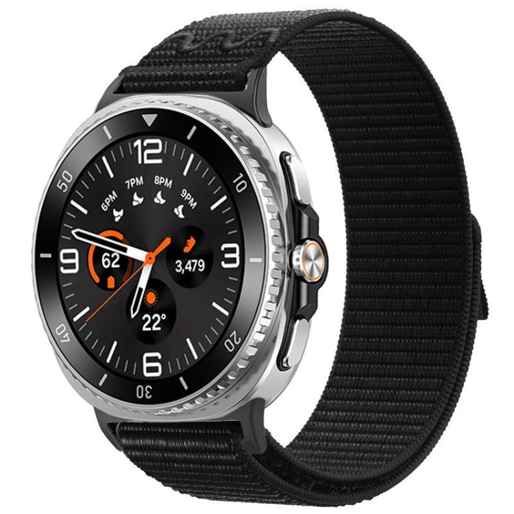 Black nylon hook-and-loop watch band shown on a silver watch.