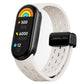 White perforated silicone watch band with black magnetic buckle and fitness tracker