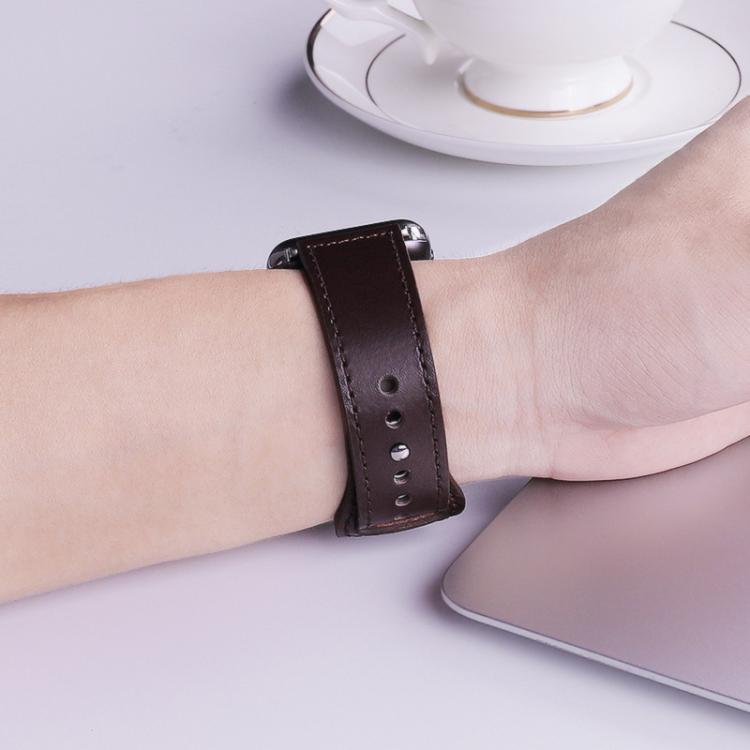 xDfind dark brown leather watch band worn on a wrist, showing stitching and adjustment holes