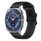Black perforated silicone watch band with buckle, shown attached to a smartwatch