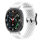 White perforated silicone watch band with a round smartwatch