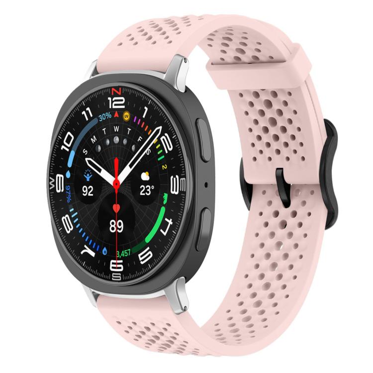 Light pink perforated silicone watch band with a round smartwatch