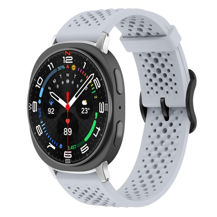 Light gray perforated silicone watch band with a round smartwatch