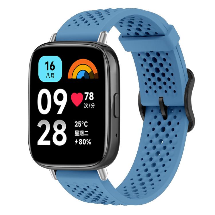 Blue perforated silicone smartwatch band shown fitted to a rectangular smartwatch