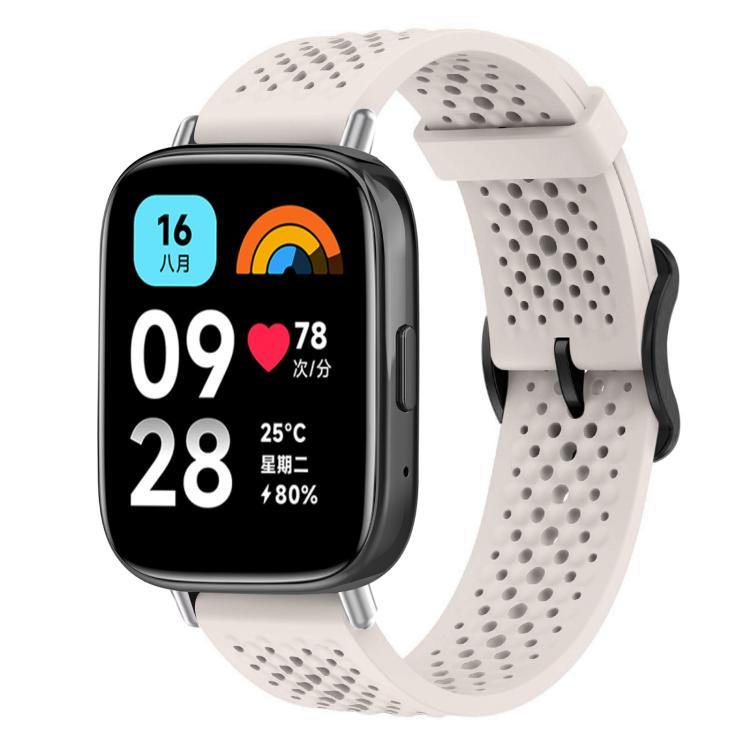 Pale pink perforated silicone smartwatch band shown fitted to a rectangular smartwatch