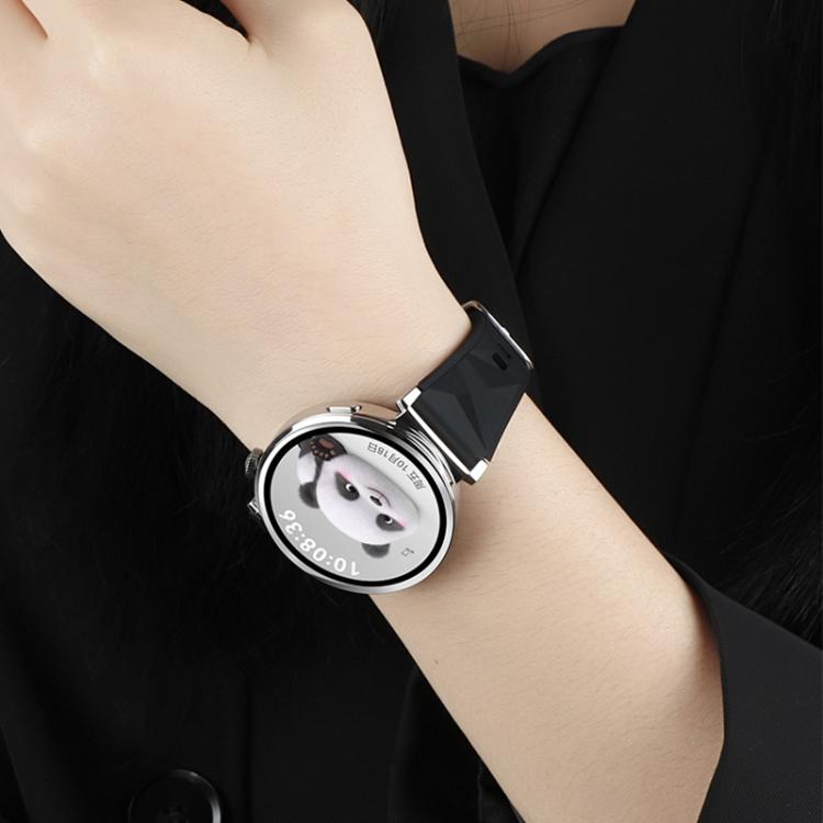 Black faceted silicone watch band worn on the wrist with a silver smartwatch