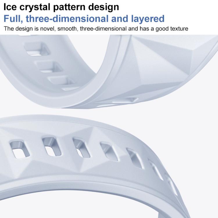 Close-up of a pale blue silicone watch band showing raised faceted texture and adjustment holes