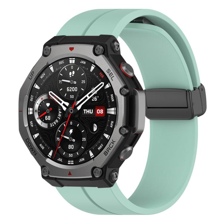 Emerald green silicone watch band with black folding buckle on an Amazfit T-Rex 3 watch