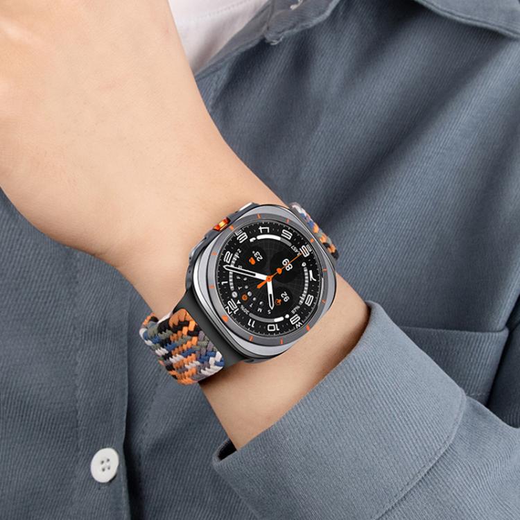 Multicolor braided nylon watch band worn with a smartwatch