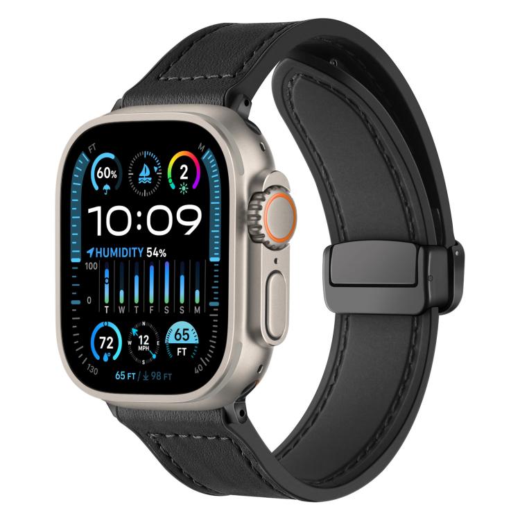 Black silicone watch band with stitched detail and magnetic buckle, shown on an Apple Watch.