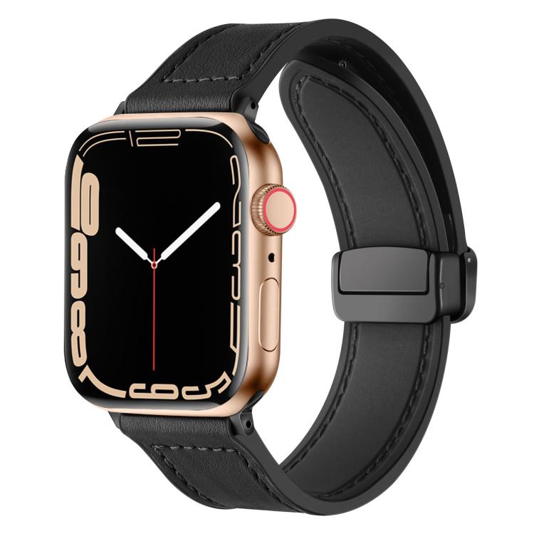Black silicone watch band with stitched detail and magnetic buckle, shown on an Apple Watch.