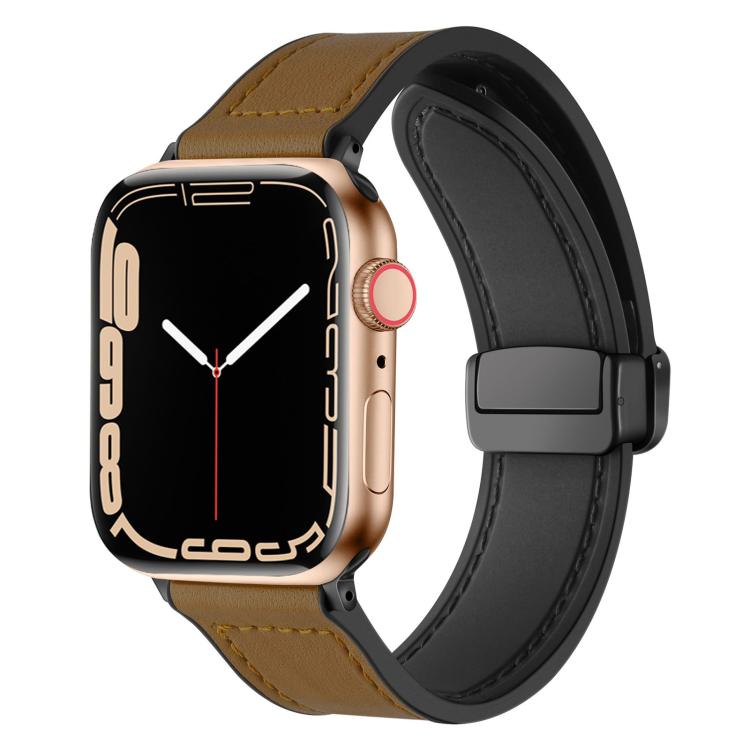 Dark brown silicone watch band with stitched detail and magnetic buckle, shown on an Apple Watch.