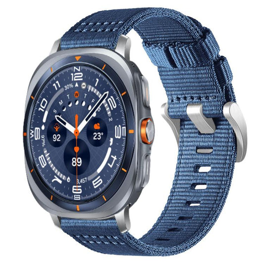 Blue two-section nylon watch band with metal hooks, shown on a silver smartwatch