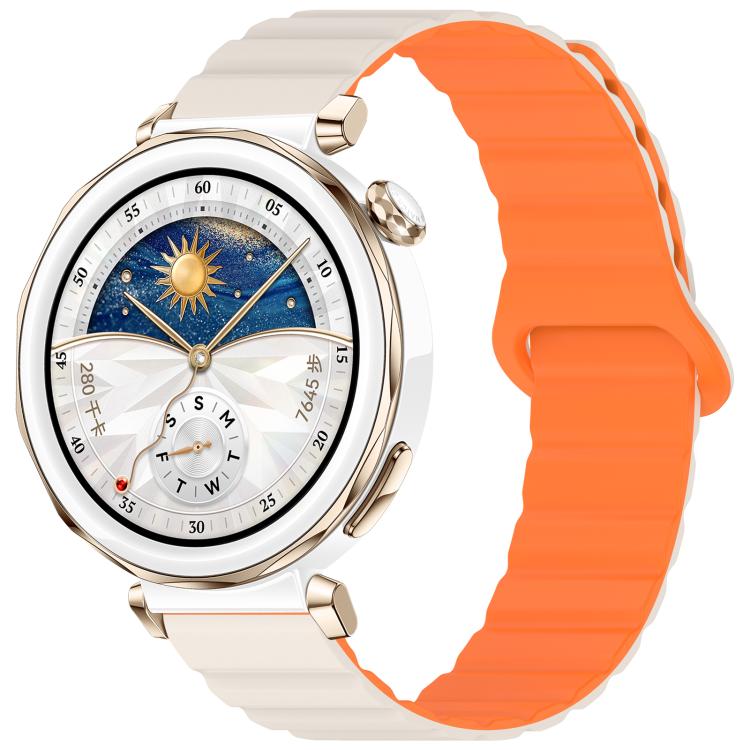 Two-tone glossy silicone watch band in white and orange, shown on a smartwatch.