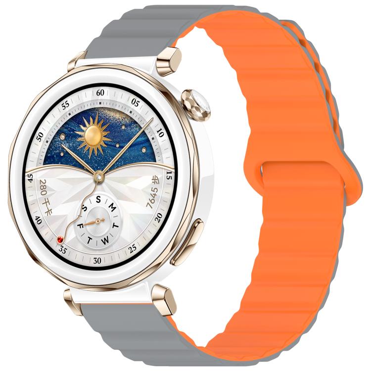 Two-tone glossy silicone watch band in gray and orange, shown on a smartwatch.