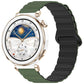 Two-tone glossy silicone watch band in army green and black, shown on a smartwatch.