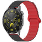 Silicone watch band in black and red with a magnetic loop closure, shown on a watch.
