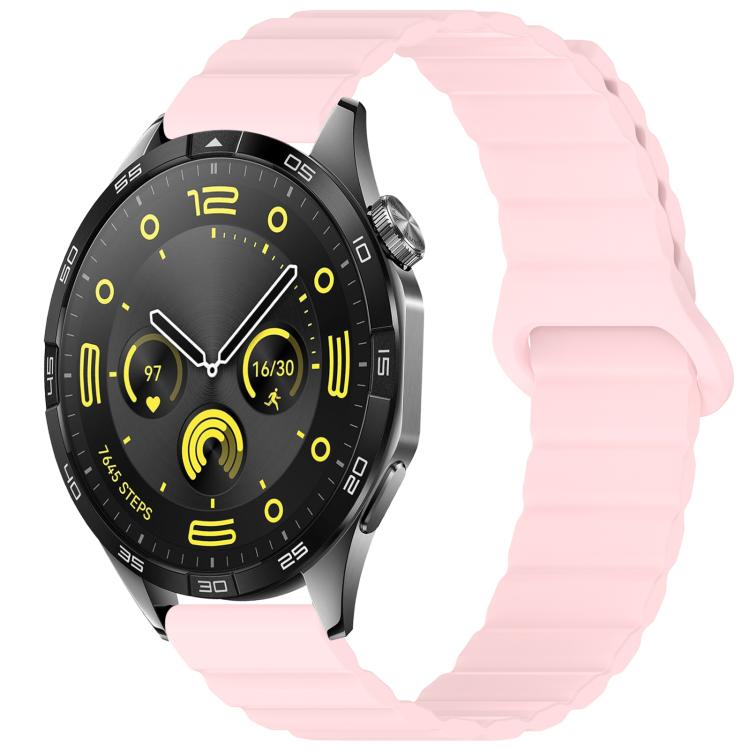 Pink silicone watch band with a magnetic loop closure, shown on a watch.