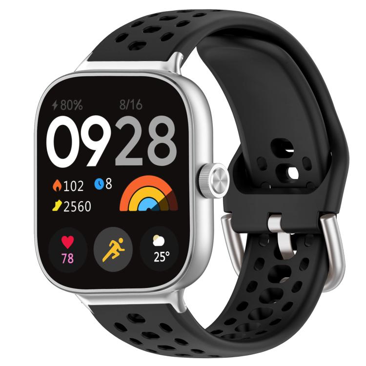 Black perforated silicone sport watch band with silver buckle on a smartwatch
